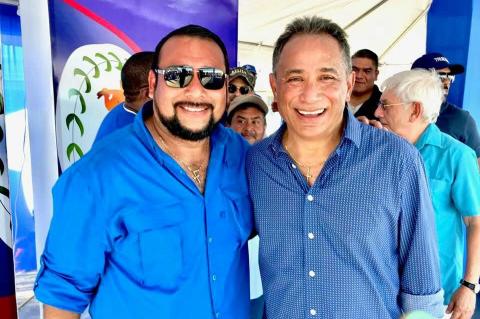 Former Minister of Agriculture, Jose Abelardo Mai seen With Prime Minister, John Briceno and PUP Clan in the background.